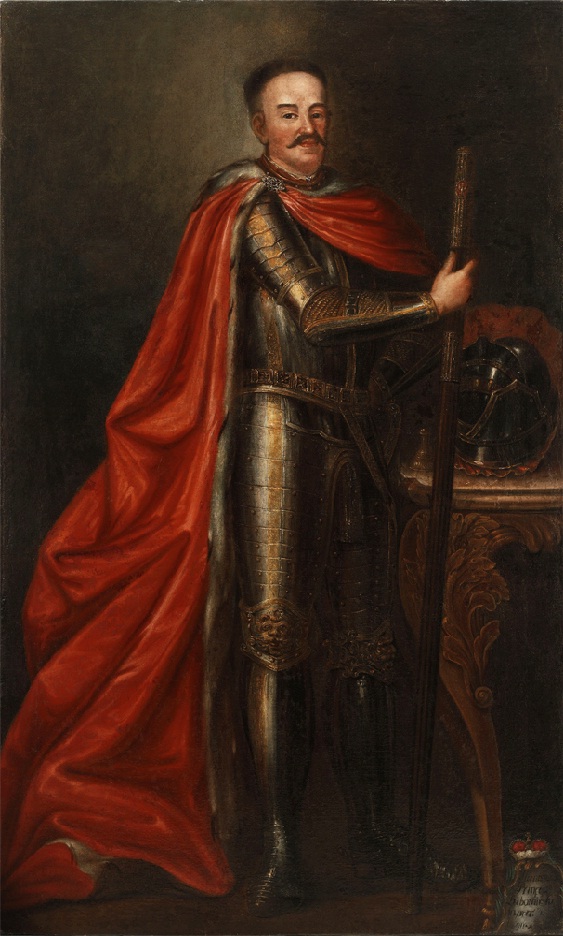 Lubomirski standing in armor and red cape, with a long staff